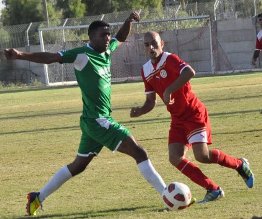 קובי שריקי (באדום)