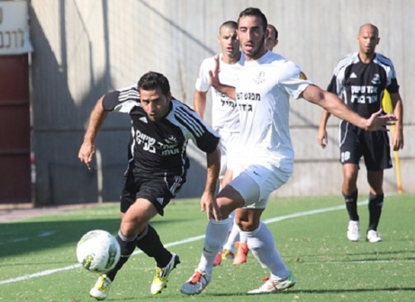 שוחרר בגלל הכסף? רבינוביץ' (בלבן. צילום: לירן דורף)