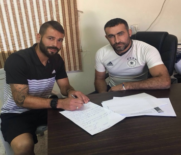 עבאס ואלמדון במעמד החתימה