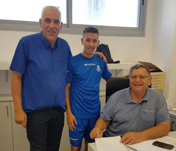 רוצ'ט במעמד החתימה