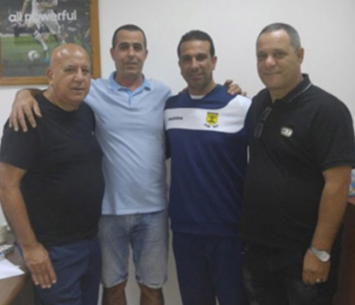 שאקי (במרכז). כשעוד היו חיוכים 