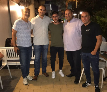 לוטטי במעמד החתימה