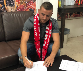 דהן במעמד החתימה