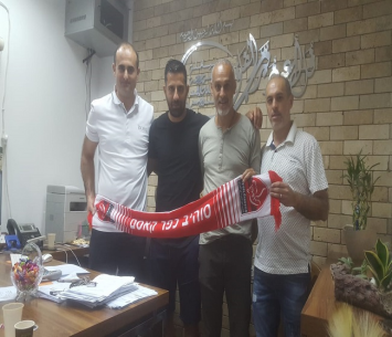 טואף במעמד החתימה