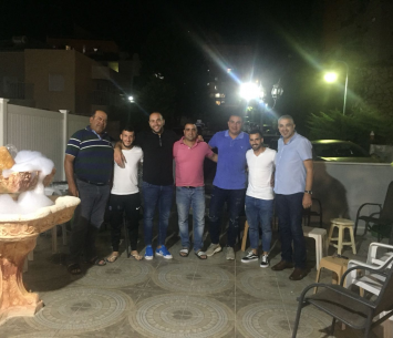 השלושה במעמד החתימה