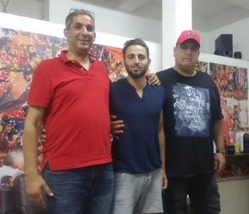 חוזר ללאומית. חלבי במעמד החתימה