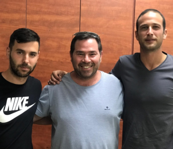 זיסקינד ותורג'מן במעמד החתימה יחד עם עידו קרן