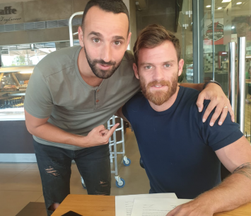 זייד לצד סוכנו אסף ואקנין