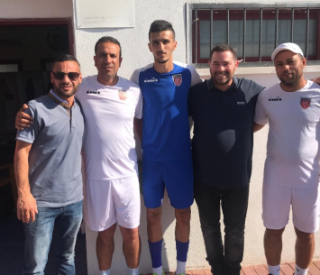 מוסטפה ועידו קרן במעמד החתימה