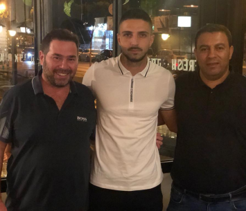 בן נעים במעמד החתימה