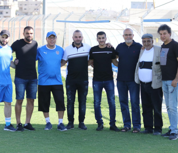 הצוות המקצועי והניהולי באימון הבכורה