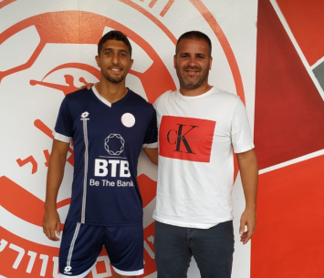 סלומון עם יחזקאל במעמד החתימה