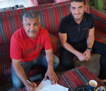 טהא במעמד החתימה