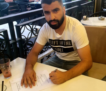 זועבי במעמד החתימה