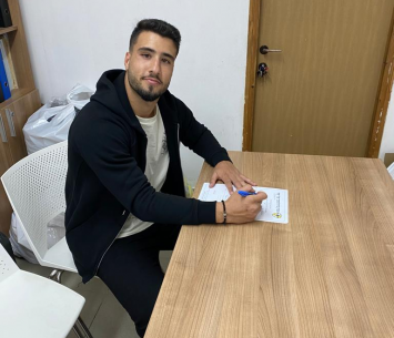 כהן במעמד החתימה