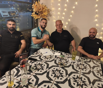 עואד במעמד החתימה