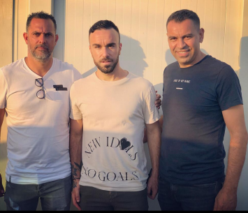 גידיץ במעמד החתימה