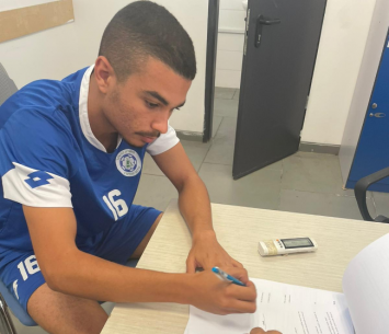 אלבכרי במעמד החתימה