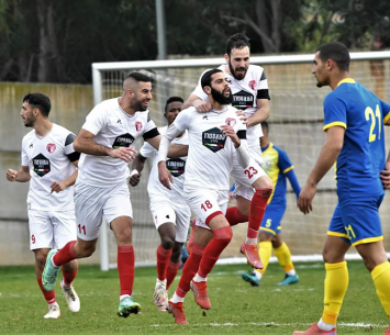 שחקני מגדל העמק חוגגים ניצחון יקר (אבי רביבו)