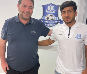 שחאדה במעמד החתימה