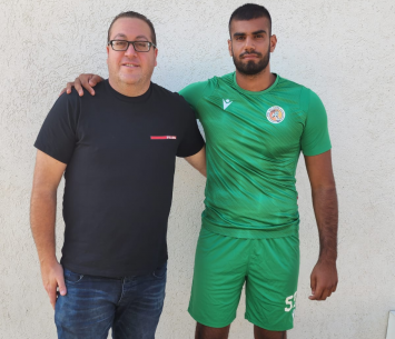 כהן במעמד החתימה