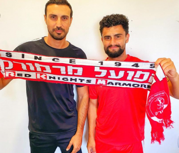 כהן במעמד החתימה