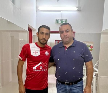 בללי במעמד החתימה 