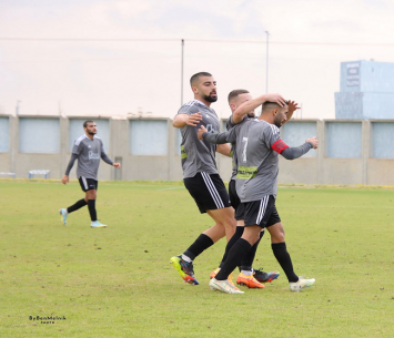 ניצחון גדול. שחקני חולון (בן מלניק)