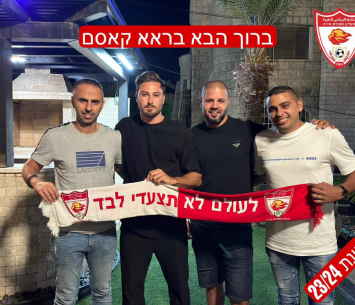 קאסם במעמד החתימה