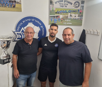 ארשיד במעמד החתימה