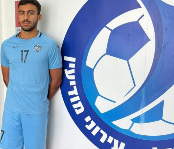 מגר במעמד החתימה