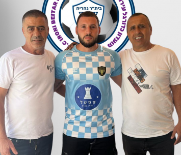 אורנשטיין במעמד החתימה