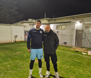 שרון במעמד החתימה