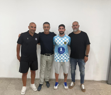ריינשטיין במעמד החתימה