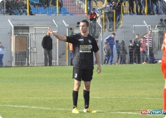 איש המחמית והמשחק. חטיב (צילום: מוחמד חאדר אניס)