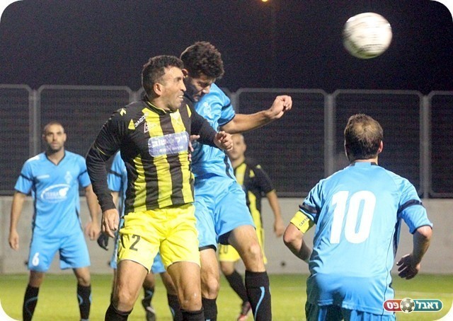 האורחת המשיכה ללחוץ. גורן וקוזושוילי (צילום: לירן דורף)