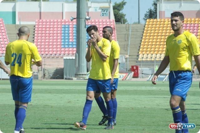 הפסד מפתיע. שחקני באר שבע (צילום: שי מוגילבסקי)