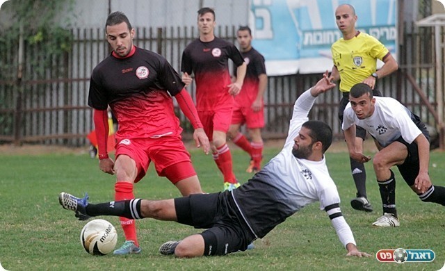 ברזילי מתקל את מוטי מלכה